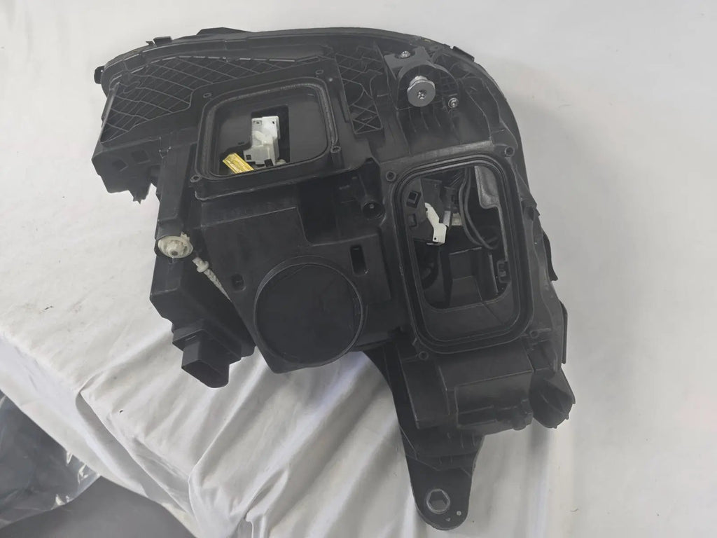 This image displays the left-side Multibeam LED headlight with blue accents for the Mercedes-Benz E-Class W213, featuring OEM genuine quality and part number A2139066504. This original used headlamp is designed for precise fitment on the W213 model, offering advanced Multibeam LED technology with distinctive blue detailing for high-performance adaptive illumination and premium styling