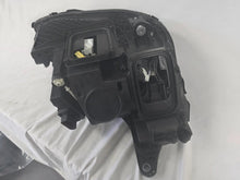 Load image into Gallery viewer, This image displays the left-side Multibeam LED headlight with blue accents for the Mercedes-Benz E-Class W213, featuring OEM genuine quality and part number A2139066504. This original used headlamp is designed for precise fitment on the W213 model, offering advanced Multibeam LED technology with distinctive blue detailing for high-performance adaptive illumination and premium styling