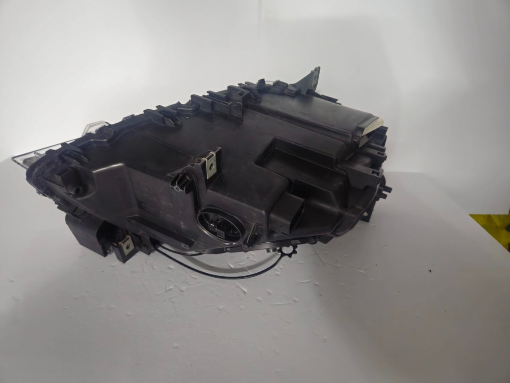 This image features the left-side Xenon headlight for the BMW 7 Series F01/F02 models, showcasing used OEM genuine quality with part number 7225229. Designed specifically for the F01 and F02 chassis, this original headlamp offers high-intensity Xenon lighting and precise fitment for the left side, ensuring reliable performance and compatibility.