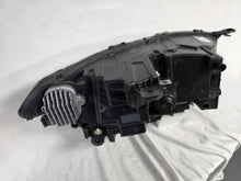 Load image into Gallery viewer, This image features the left-side Xenon headlight for the Volvo XC90, showcasing OEM genuine quality with part number 32404715. This used original headlamp is designed for accurate fitment and delivers powerful Xenon illumination, ensuring optimal visibility, durability, and premium performance for the XC90 luxury SUV