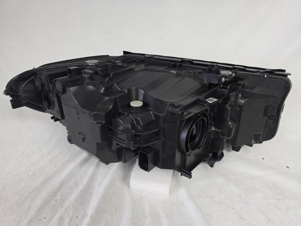 This image shows the left-side LED headlight for the BMW 5 Series G30 and G31 models, featuring OEM genuine quality with part number 7439199. This used original headlamp is engineered for a precise fit on the left side, offering bright and efficient LED illumination, modern styling, and the reliable performance expected from BMW components.