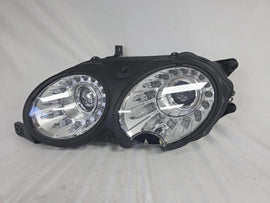 This image shows the left-side headlight for the 2014–2019 Bentley Flying Spur, featuring OEM genuine quality with part number 4W1941015H. This used original headlamp is in excellent condition, offering premium illumination, elegant design, and a precise fit for Bentley’s high-end luxury sedan