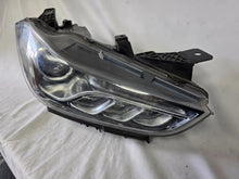 Load image into Gallery viewer, This image shows the right-side Xenon headlight for the Maserati Ghibli models from 2014 to 2017, featuring OEM genuine quality with part number 00670004658. This used original headlamp is designed for perfect fitment, delivering powerful Xenon lighting and the signature sleek styling expected from Maserati’s luxury performance vehicles