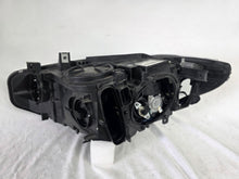 Load image into Gallery viewer, Genuine used BMW Adaptive LED headlight for 4 Series models F32, F33, F36, F80 LCI, F82, and F83. This right-side OEM headlamp, part number 7377842, is designed with adaptive lighting technology for improved visibility and performance. The image highlights the complete original headlight unit in used condition, including the clear lens, mounting points, and electrical connectors — ideal for replacement on compatible BMW models.
