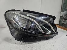 Load image into Gallery viewer, This image features the right-side LED High Performance headlight for the Mercedes-Benz E-Class W213, showcasing OEM genuine quality with part number A2139064004. Specifically designed for the W213 model, this used headlight offers high-performance LED illumination and is an original Mercedes-Benz component, ensuring precise fit and reliable functionality