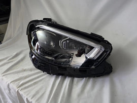This image features the right-side MultiBeam LED headlight for the Mercedes-Benz E-Class W213 Facelift (FL) model, with OEM genuine quality and part number A2139068409. This used original headlamp is designed for the facelifted W213, offering precision-fit installation, advanced MultiBeam LED technology for adaptive lighting, and the premium performance expected from Mercedes-Benz components.