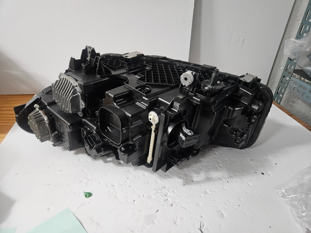 This image displays the right-side Laser headlight for BMW 5 Series G30, G31, and F90 LCI models, featuring OEM genuine quality with part number 9850588. This used original headlamp is designed for a precise fit on the facelifted (LCI) versions of the 5 Series, delivering advanced BMW Laserlight technology for superior visibility, performance, and modern styling