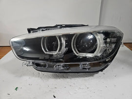 This image features the left-side LED headlight for the BMW 1 Series F20 and F21 LCI (facelift) models, with OEM genuine quality and part number 7492621. This used original headlamp is designed specifically for the facelifted versions, offering sharp LED illumination, precise fitment, and the premium build quality expected from BMW OEM components