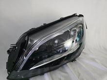 Load image into Gallery viewer, This image features the left-side Multibeam LED headlight for the Mercedes-Benz C-Class W205 Facelift (FL) model, with OEM genuine quality and part number A2059061506. This used original headlamp is designed for a perfect fit on the facelifted W205, delivering advanced Multibeam LED technology for precise, adaptive lighting and optimal driving visibility