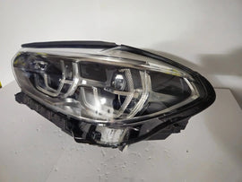This image shows the left-side ICON Adaptive LED headlight for BMW models iX3 G08, X3 G01, X3 M F97, X4 G02, and X4 M F98, featuring OEM genuine quality with part number 7466119. This used original headlamp is designed to deliver BMW’s signature Adaptive LED lighting with ICON styling, ensuring precise fitment, enhanced visibility, and modern aesthetics for these high-performance models.