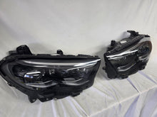 Load image into Gallery viewer, This image showcases the OEM genuine DIGITAL LIGHT headlights for the Mercedes-Benz E-Class W214, available for both right and left sides with part numbers A2149066102 (right) and A2149066202 (left). These advanced headlamps are original Mercedes-Benz components designed for the W214 model, offering cutting-edge DIGITAL LIGHT technology that enhances driving safety and precision lighting. The headlights are used but maintain high-quality OEM standards and are ideal replacements for the corresponding side.