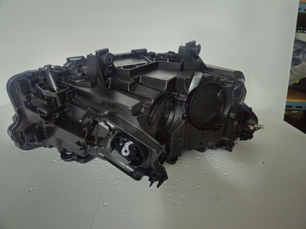 This image features the left-side Adaptive LED headlight for BMW models including iX3 G08, X3 G01, X3 M F97, X4 G02, and X4 M F98, with OEM genuine quality and part number 5A29203. This used original headlamp provides precise fitment and BMW’s advanced Adaptive LED technology, ensuring enhanced visibility, dynamic beam control, and premium styling for these performance SUVs.