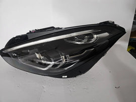 This image displays the left-side LED headlight for the BMW Z4 G29 model, featuring OEM genuine quality with part number 9481251. This used original headlamp is specifically designed for the G29 generation, offering precise fitment, sharp LED illumination, and the sleek, sporty design that complements the Z4's dynamic appearance.