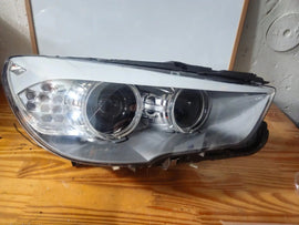 This image shows the right-side Bi-Xenon headlight for the BMW 5 Series GT F07 model, featuring OEM genuine quality with part number 7262720. It is a used original headlight designed for precise fit on the right side of the BMW F07 Gran Turismo, offering advanced Bi-Xenon lighting performance and durable OEM construction