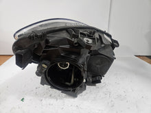 Load image into Gallery viewer, This image shows the left-side Xenon headlight for the Mercedes-Benz CLA Class C117, featuring original OEM quality with part number A1179065100. The headlight is a used but genuine component, designed to perfectly fit the left side of the CLA C117 model. It includes the factory-built Xenon lighting system and showcases the durable construction expected from Mercedes-Benz parts.