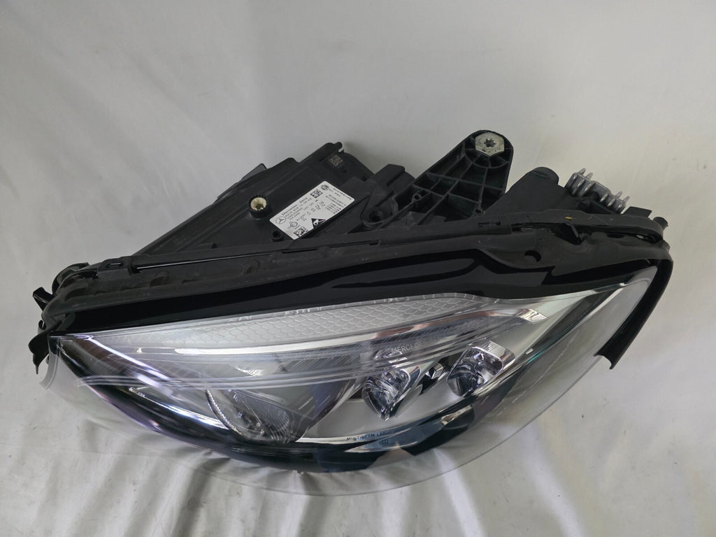 This image features the left-side Multibeam LED headlight for the Mercedes-Benz C-Class W205 Facelift (FL) model, with OEM genuine quality and part number A2059061506. This used original headlamp is designed for a perfect fit on the facelifted W205, delivering advanced Multibeam LED technology for precise, adaptive lighting and optimal driving visibility