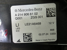 Load image into Gallery viewer, This image showcases the OEM genuine DIGITAL LIGHT headlights for the Mercedes-Benz E-Class W214, available for both right and left sides with part numbers A2149066102 (right) and A2149066202 (left). These advanced headlamps are original Mercedes-Benz components designed for the W214 model, offering cutting-edge DIGITAL LIGHT technology that enhances driving safety and precision lighting. The headlights are used but maintain high-quality OEM standards and are ideal replacements for the corresponding side.
