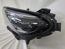 Load image into Gallery viewer, This image showcases the OEM genuine DIGITAL LIGHT headlights for the Mercedes-Benz E-Class W214, available for both right and left sides with part numbers A2149066102 (right) and A2149066202 (left). These advanced headlamps are original Mercedes-Benz components designed for the W214 model, offering cutting-edge DIGITAL LIGHT technology that enhances driving safety and precision lighting. The headlights are used but maintain high-quality OEM standards and are ideal replacements for the corresponding side.