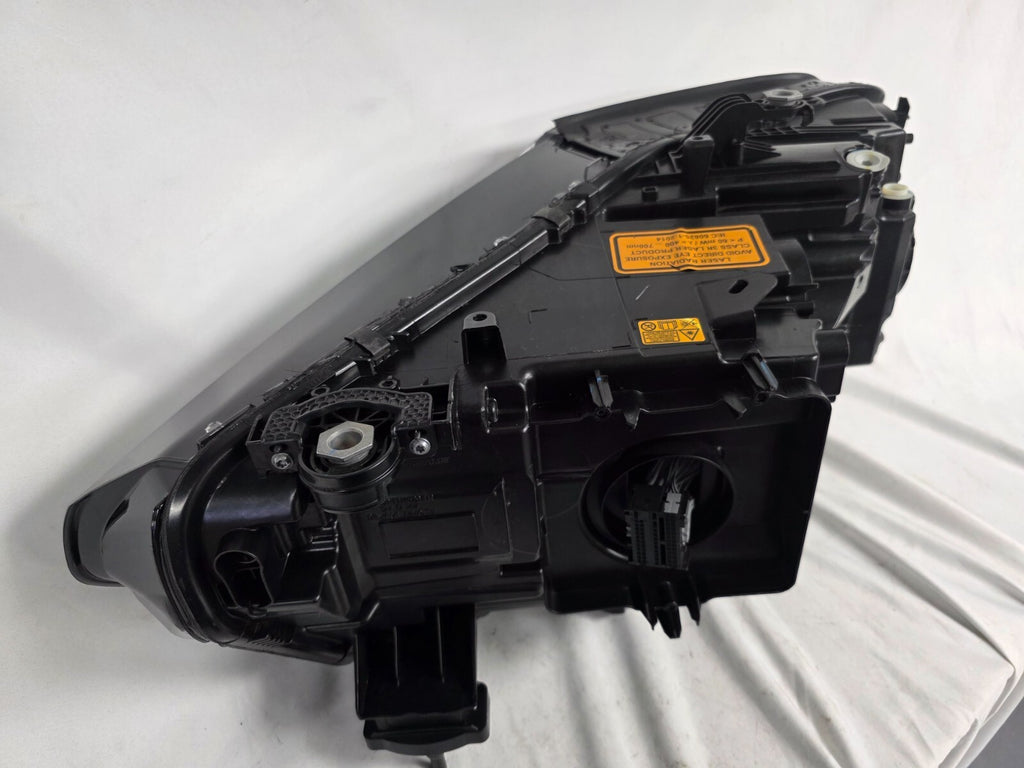 This image displays the right-side Laser headlight for BMW models X5 G05, X5 M F95, X6 G06, and X6 M F96, featuring OEM genuine quality with part number 5A27998. This used original headlamp delivers cutting-edge BMW Laserlight technology, offering enhanced night visibility, precise fitment, and a sleek, high-performance design tailored for these luxury SUV models.