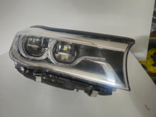 Load image into Gallery viewer, This image features the right-side Adaptive LED headlight (ICON design) for the BMW 7 Series G11 and G12 models, showcasing OEM genuine quality with part number 7408710. This used original headlamp offers BMW’s signature Adaptive LED with ICON styling, providing dynamic lighting performance, precise fitment, and premium functionality tailored for the luxury 7 Series lineup.