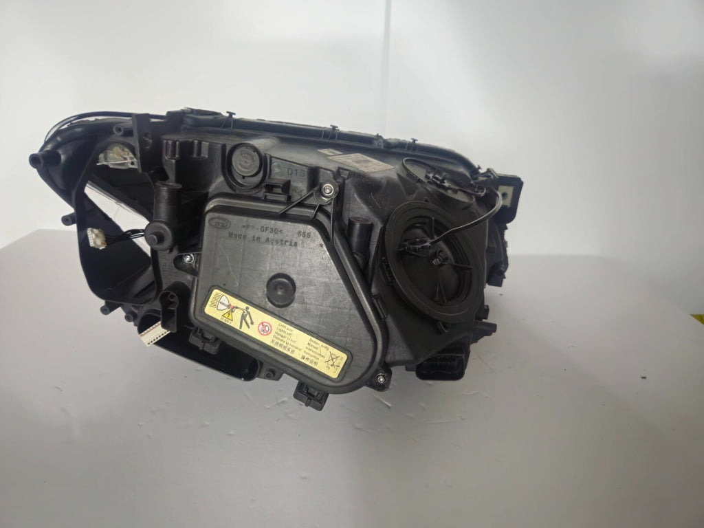 This image features the left-side Xenon headlight for the BMW 7 Series F01/F02 models, showcasing used OEM genuine quality with part number 7225229. Designed specifically for the F01 and F02 chassis, this original headlamp offers high-intensity Xenon lighting and precise fitment for the left side, ensuring reliable performance and compatibility.