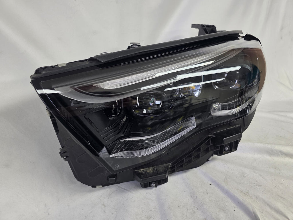 This image showcases the OEM genuine DIGITAL LIGHT headlights for the Mercedes-Benz E-Class W214, available for both right and left sides with part numbers A2149066102 (right) and A2149066202 (left). These advanced headlamps are original Mercedes-Benz components designed for the W214 model, offering cutting-edge DIGITAL LIGHT technology that enhances driving safety and precision lighting. The headlights are used but maintain high-quality OEM standards and are ideal replacements for the corresponding side.