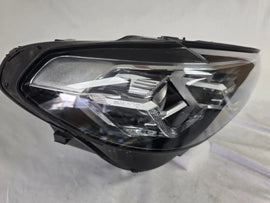 Genuine OEM Adaptive LED headlight for BMW iX3 and compatible models including G08, G01, F97, G02, and F98 with LCI (facelift) updates. This right-side headlamp, part number 5A29204, features adaptive lighting technology for enhanced road illumination and driving safety. The image showcases the original right LED headlight in used condition, clearly showing the lens, housing, and connector points — perfect for replacement on BMW iX3 and related LCI models.