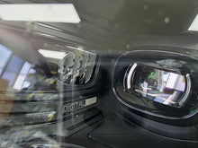 Load image into Gallery viewer, This image showcases the OEM genuine DIGITAL LIGHT headlights for the Mercedes-Benz E-Class W214, available for both right and left sides with part numbers A2149066102 (right) and A2149066202 (left). These advanced headlamps are original Mercedes-Benz components designed for the W214 model, offering cutting-edge DIGITAL LIGHT technology that enhances driving safety and precision lighting. The headlights are used but maintain high-quality OEM standards and are ideal replacements for the corresponding side.
