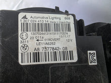 Load image into Gallery viewer, Genuine used BMW Adaptive LED headlight for 4 Series models F32, F33, F36, F80 LCI, F82, and F83. This right-side OEM headlamp, part number 7377842, is designed with adaptive lighting technology for improved visibility and performance. The image highlights the complete original headlight unit in used condition, including the clear lens, mounting points, and electrical connectors — ideal for replacement on compatible BMW models.