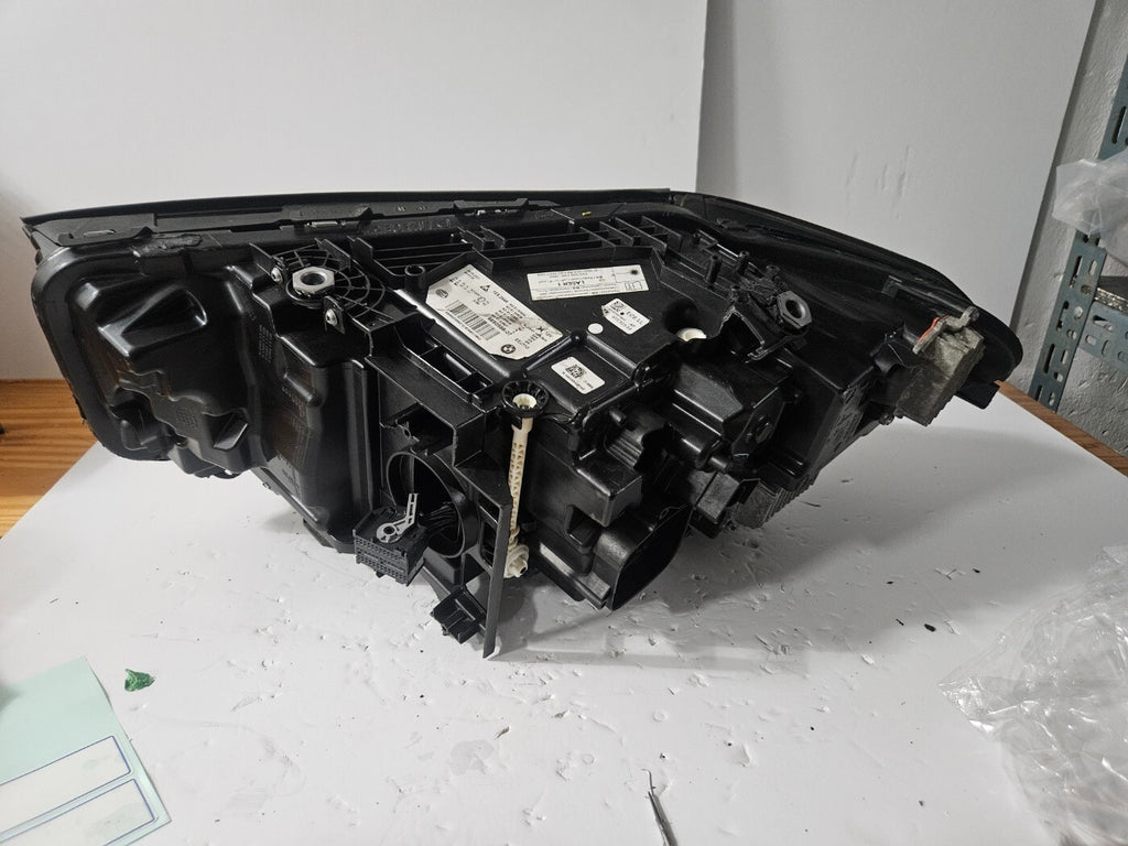 This image displays the right-side Laser headlight for BMW 5 Series G30, G31, and F90 LCI models, featuring OEM genuine quality with part number 9850588. This used original headlamp is designed for a precise fit on the facelifted (LCI) versions of the 5 Series, delivering advanced BMW Laserlight technology for superior visibility, performance, and modern styling
