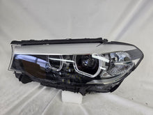 Load image into Gallery viewer, This image shows the left-side LED headlight for the BMW 5 Series G30 and G31 models, featuring OEM genuine quality with part number 7439199. This used original headlamp is engineered for a precise fit on the left side, offering bright and efficient LED illumination, modern styling, and the reliable performance expected from BMW components.