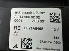 Load image into Gallery viewer, This image showcases the OEM genuine DIGITAL LIGHT headlights for the Mercedes-Benz E-Class W214, available for both right and left sides with part numbers A2149066102 (right) and A2149066202 (left). These advanced headlamps are original Mercedes-Benz components designed for the W214 model, offering cutting-edge DIGITAL LIGHT technology that enhances driving safety and precision lighting. The headlights are used but maintain high-quality OEM standards and are ideal replacements for the corresponding side.