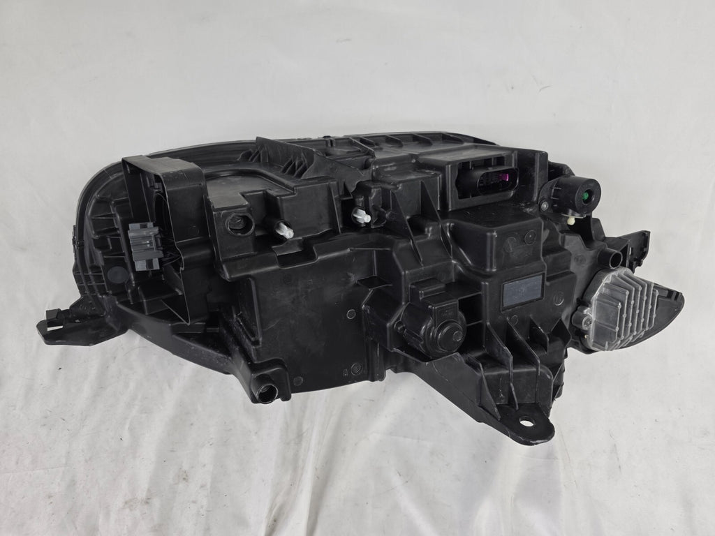 This image features the left-side Xenon headlight for the Volvo XC90, showcasing OEM genuine quality with part number 32404715. This used original headlamp is designed for accurate fitment and delivers powerful Xenon illumination, ensuring optimal visibility, durability, and premium performance for the XC90 luxury SUV