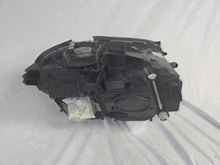 Load image into Gallery viewer, This image displays the left-side Multibeam LED headlight with blue accents for the Mercedes-Benz E-Class W213, featuring OEM genuine quality and part number A2139066504. This original used headlamp is designed for precise fitment on the W213 model, offering advanced Multibeam LED technology with distinctive blue detailing for high-performance adaptive illumination and premium styling