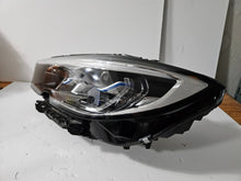 Load image into Gallery viewer, Genuine used BMW Laser headlight for 3 Series models G20 and G21. This left-side OEM headlamp, part number 9481707, features high-performance laser lighting technology for superior road visibility and driving precision. The image showcases the original left laser headlight in used condition, clearly showing the lens structure, housing, and connector ports — ideal for replacing a damaged headlamp on compatible BMW 3 Series vehicles.

